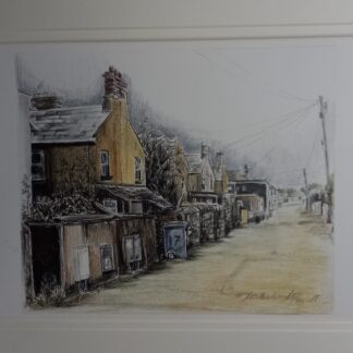 View of victorian terraced houses from the back on bin day